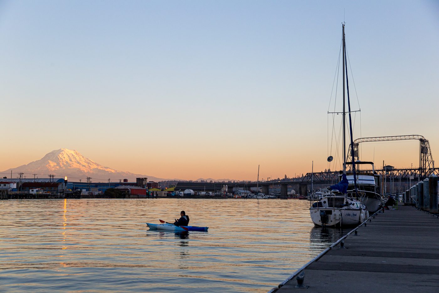 Kayaker on Commencement Bay with Mount Rainier behind, Tacoma, Washington